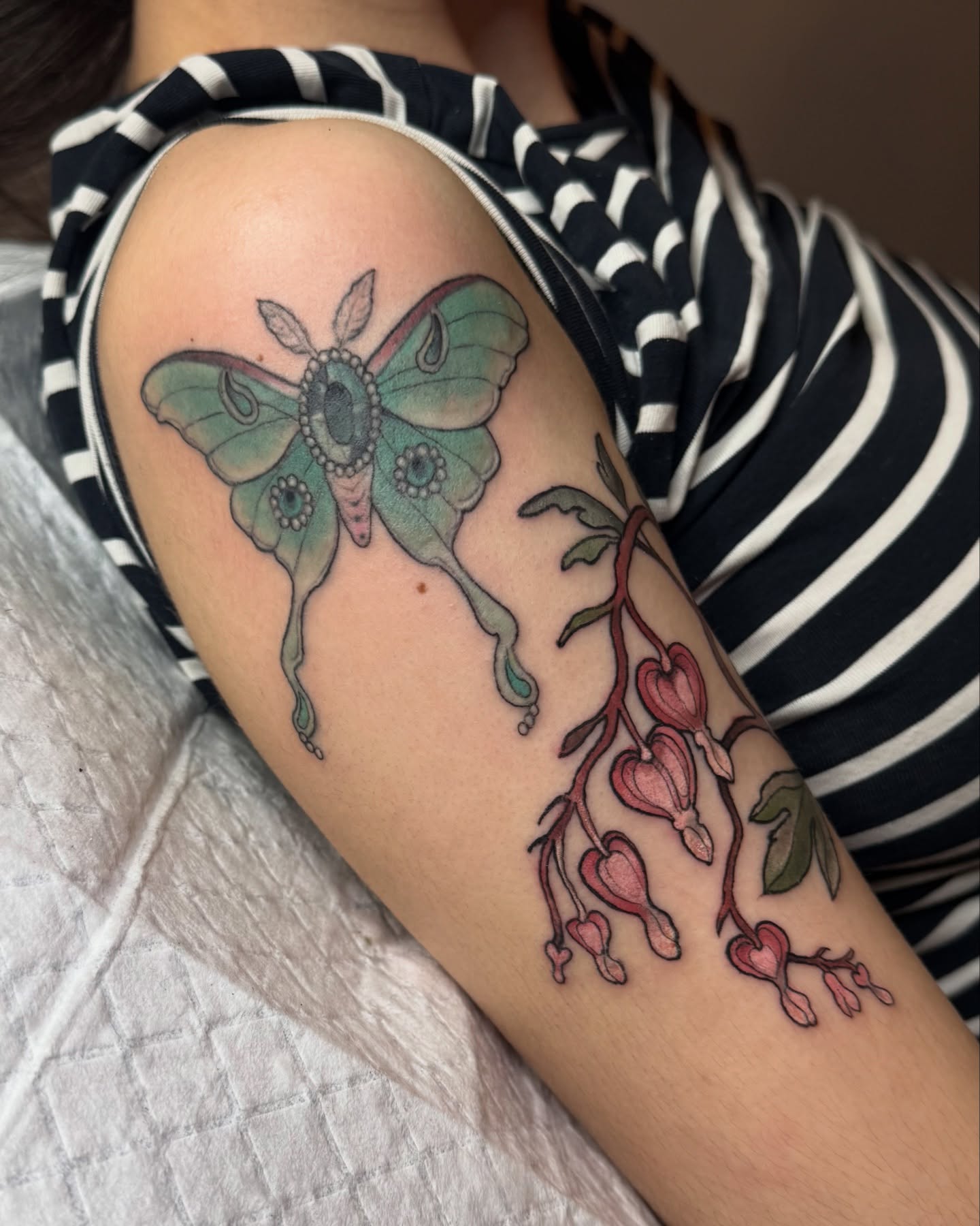 Bleeding hearts❣️I love this placement so much. Jewel moth is healed w some touch ups. Thank you soo much!