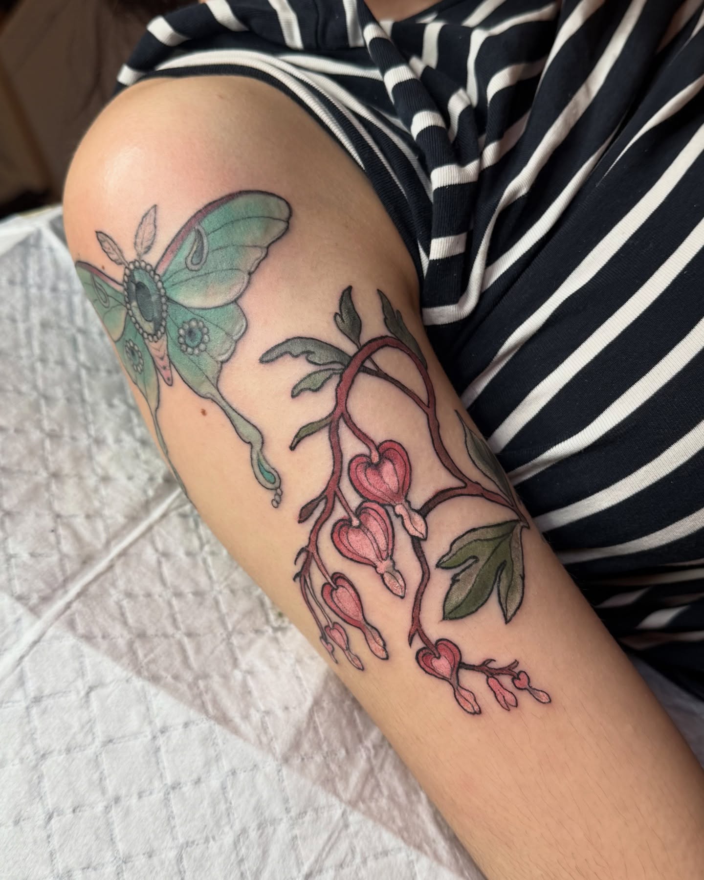 Bleeding hearts❣️I love this placement so much. Jewel moth is healed w some touch ups. Thank you soo much!