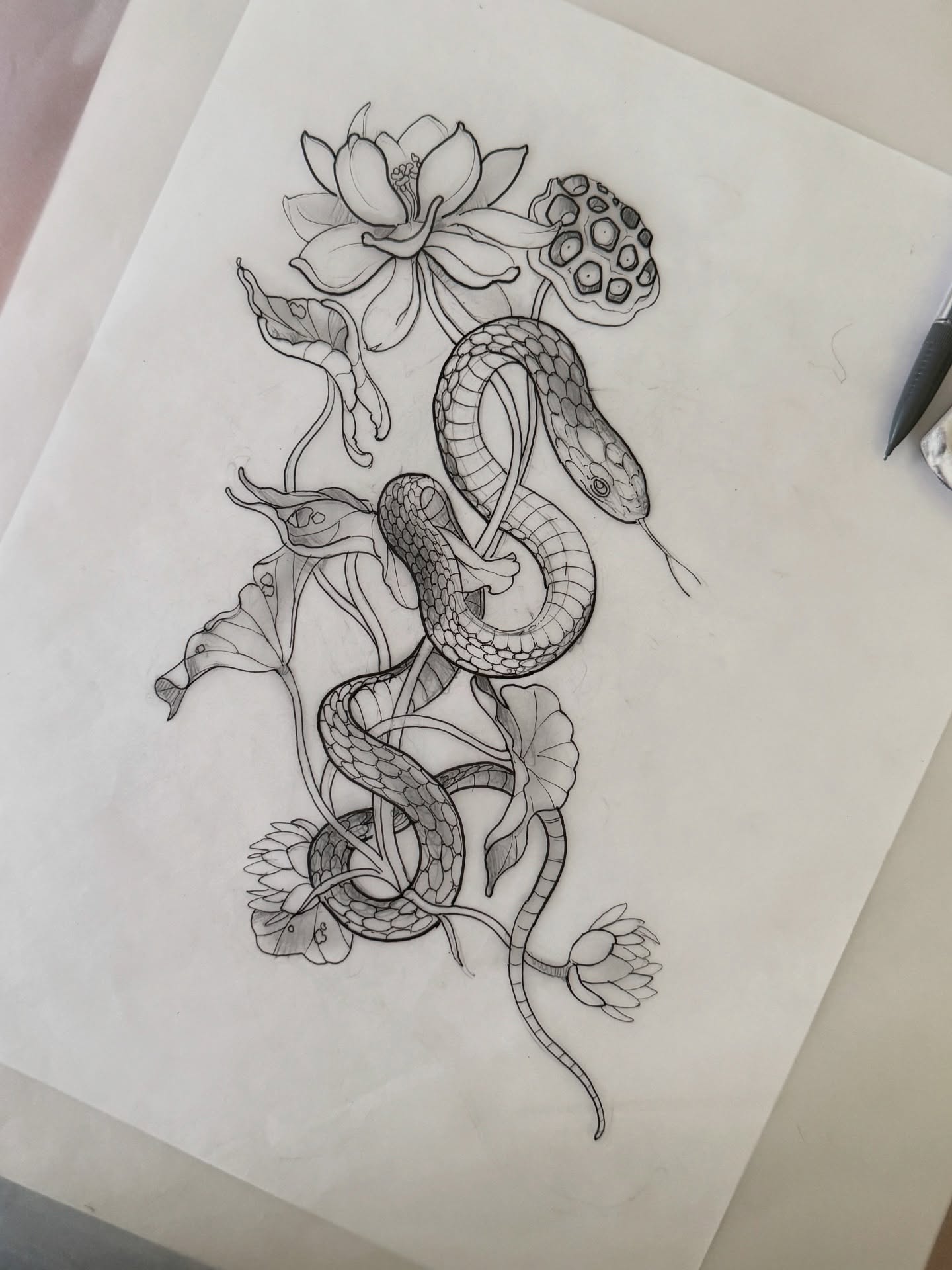 Swamp snake, lotus flowers and a gross seed pod #trichoph*bia 🤮available to be tattooed !