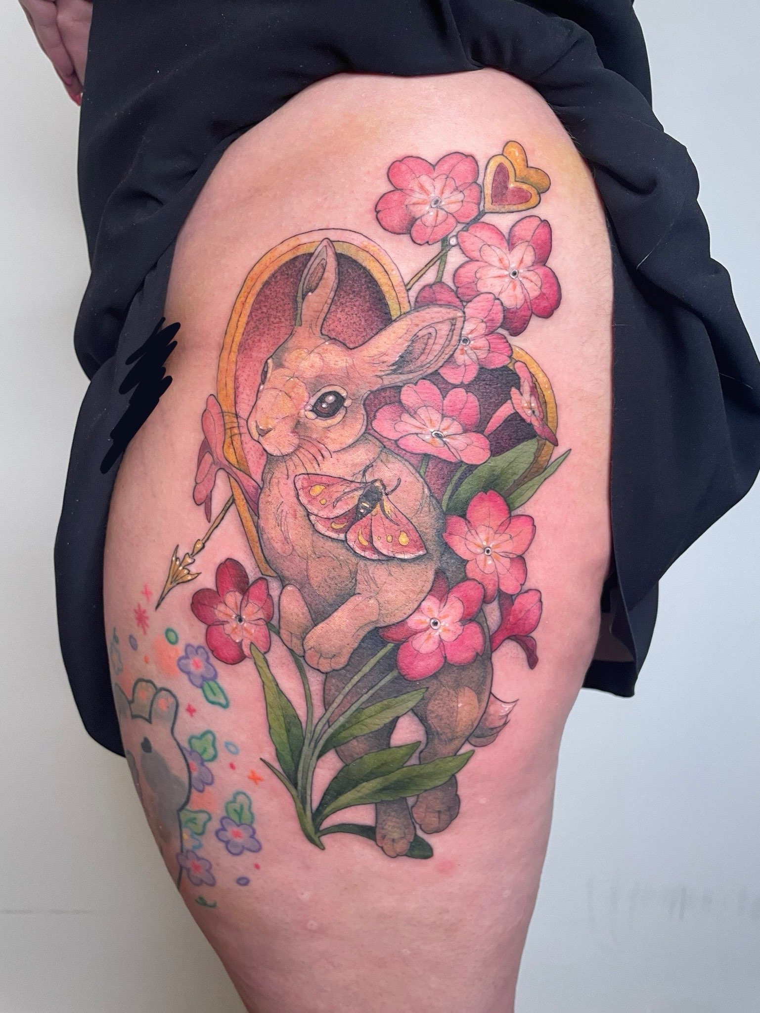 Bunny with heart tattoo